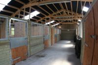 Internal view of barn showing internal stables. 