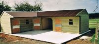 2 - 14 x 12 stables, standard corner unit and an 8 x 12 hay store, with a red onduline roof. 