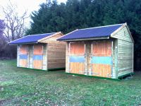 2 Field Shelters used as tack rooms, each with stable doors - on metal skids.